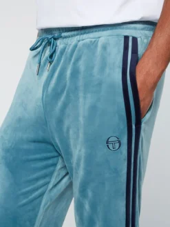 Hot Debossed Damarindo Velour Track Pant- Larkspur Pants And Sweatpants
